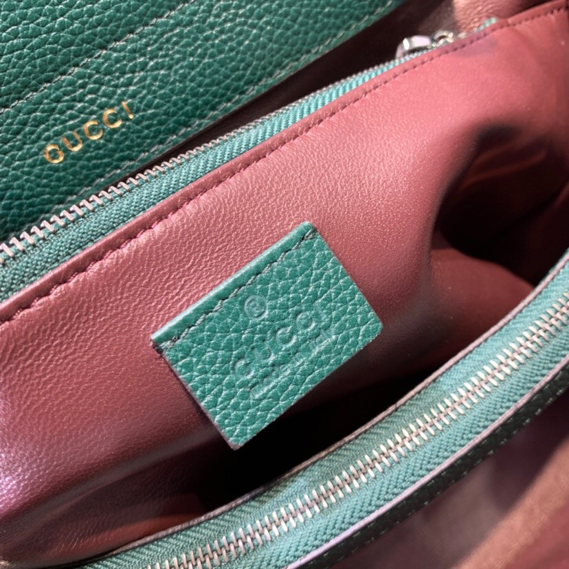 G*u*i zumi grainy leather small top handle bag