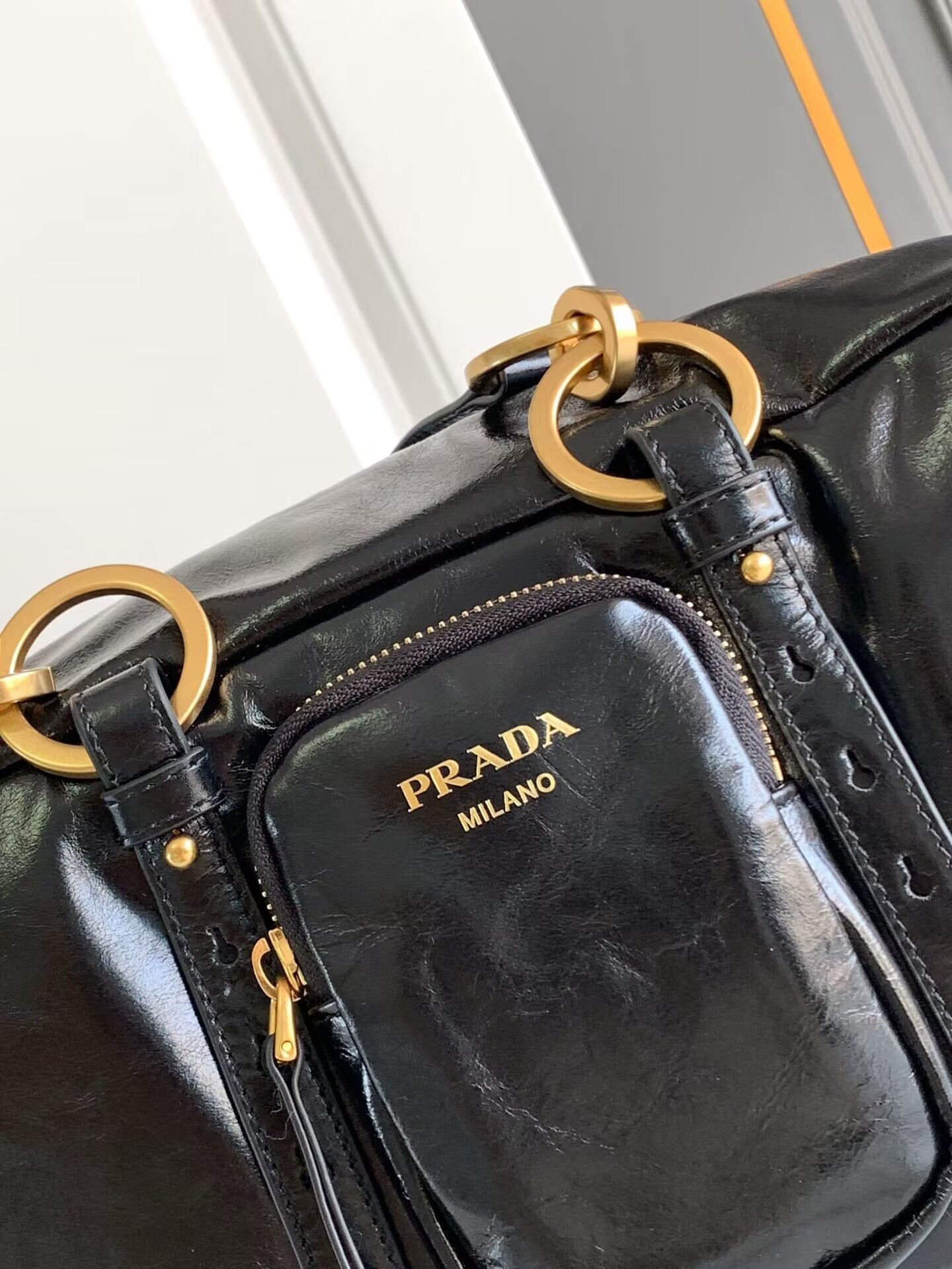 Pra*a dangle medium leather top-handle bag 14x30x13.5cm