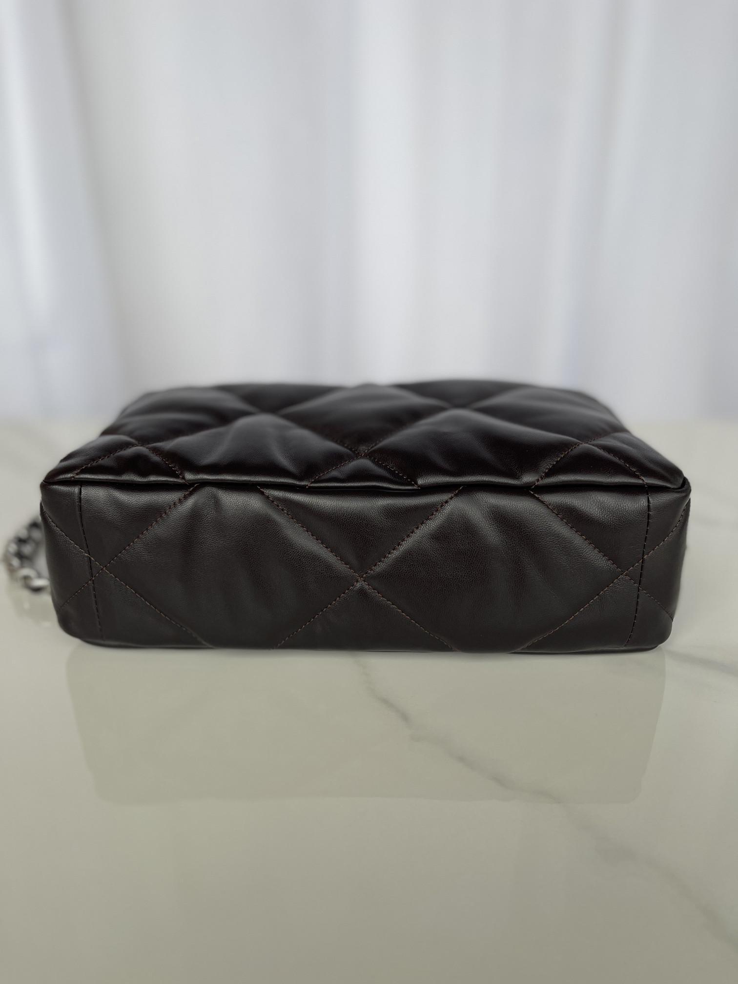 Ch*el 19 large handbag shiny leather black, gold-tone, silver-tone & ruthenium-finish metal 7.8 × 11.7 × 3.9 in