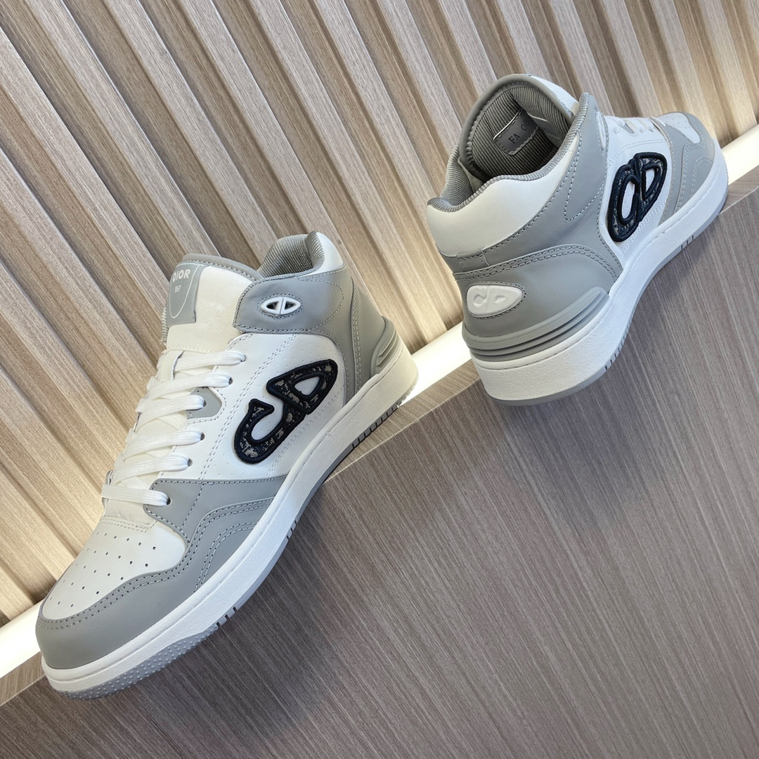 ua D*or b57 mid-top sneaker gray and white