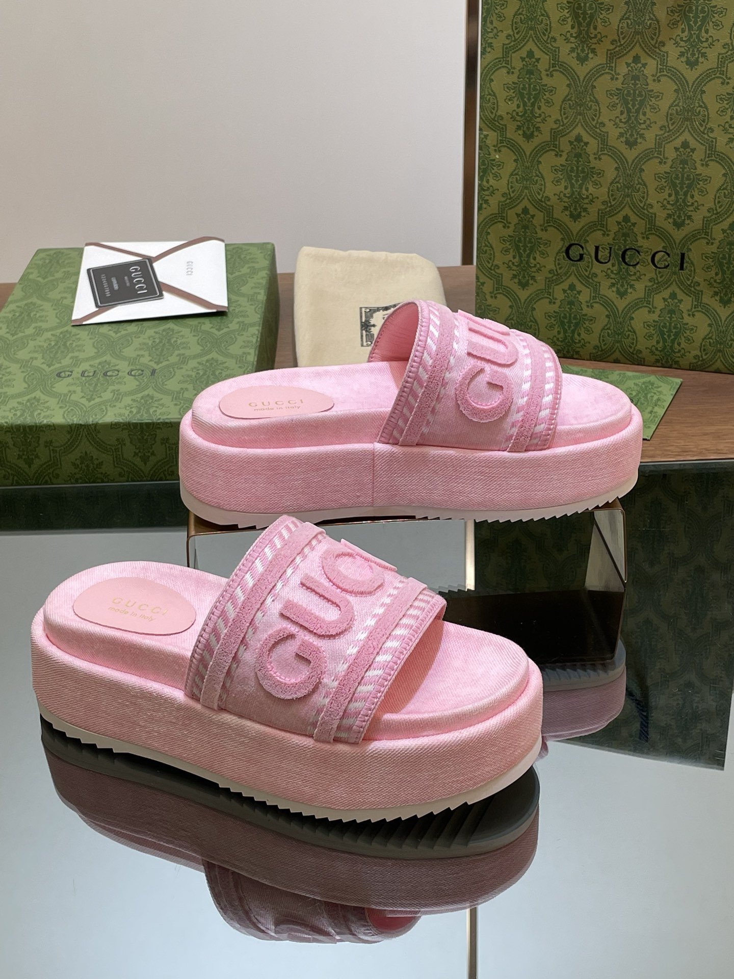 ua G*u*i slide sandal with G*u*i script