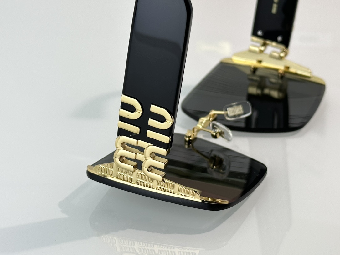 Miu Miu Glasses SMU78V 64-17-140